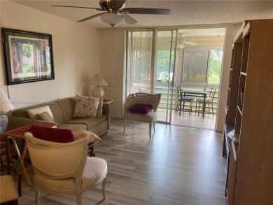 Sacious 1 Bedroom 1.5 baths 55+ Communty in Sunrise Lakes Phase on Sunrise Lakes Phase III in Florida - for sale on GolfHomes.com, golf home, golf lot