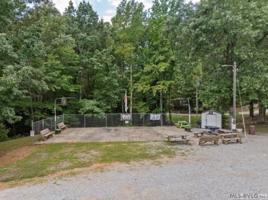 Enjoy the perfect blend of comfort and recreation in this 2 bed on River Ridge Golf Club in Virginia - for sale on GolfHomes.com, golf home, golf lot
