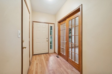 Welcome to this inviting 3-bedroom, 2-bath ranch offering on Streamwood Oaks Golf Club in Illinois - for sale on GolfHomes.com, golf home, golf lot