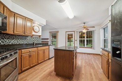 Welcome to this inviting 3-bedroom, 2-bath ranch offering on Streamwood Oaks Golf Club in Illinois - for sale on GolfHomes.com, golf home, golf lot