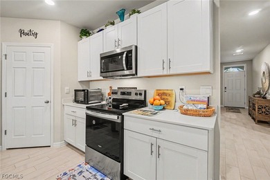 WELCOME TO YOUR SLICE OF SHUNSHINE IN MAGNOLIA LANDING! This on Herons Glen Golf and Country Club in Florida - for sale on GolfHomes.com, golf home, golf lot