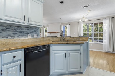 Welcome to this beautifully updated 3-bedroom, 2-bath home on Gulf Hills Golf Club in Mississippi - for sale on GolfHomes.com, golf home, golf lot