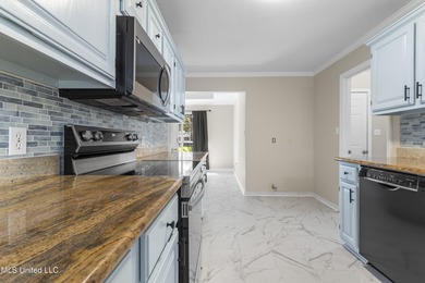 Welcome to this beautifully updated 3-bedroom, 2-bath home on Gulf Hills Golf Club in Mississippi - for sale on GolfHomes.com, golf home, golf lot