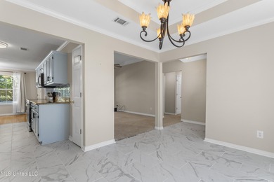 Welcome to this beautifully updated 3-bedroom, 2-bath home on Gulf Hills Golf Club in Mississippi - for sale on GolfHomes.com, golf home, golf lot