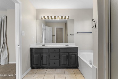 Welcome to this beautifully updated 3-bedroom, 2-bath home on Gulf Hills Golf Club in Mississippi - for sale on GolfHomes.com, golf home, golf lot