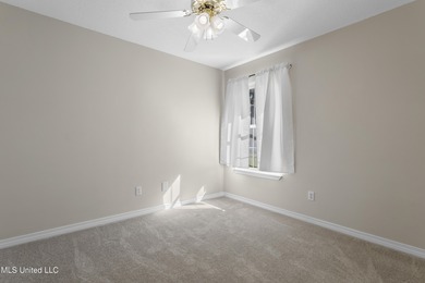 Welcome to this beautifully updated 3-bedroom, 2-bath home on Gulf Hills Golf Club in Mississippi - for sale on GolfHomes.com, golf home, golf lot