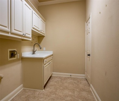Experience exceptional golf course living in this elegant on The Trails of Frisco Golf Club in Texas - for sale on GolfHomes.com, golf home, golf lot