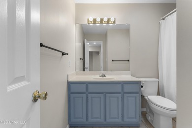 Welcome to this beautifully updated 3-bedroom, 2-bath home on Gulf Hills Golf Club in Mississippi - for sale on GolfHomes.com, golf home, golf lot