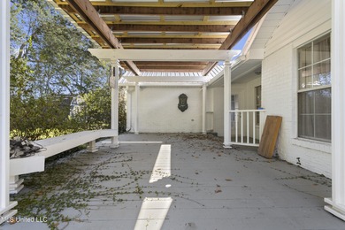 Welcome to this beautifully updated 3-bedroom, 2-bath home on Gulf Hills Golf Club in Mississippi - for sale on GolfHomes.com, golf home, golf lot