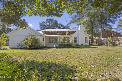 Welcome to this beautifully updated 3-bedroom, 2-bath home on Gulf Hills Golf Club in Mississippi - for sale on GolfHomes.com, golf home, golf lot