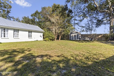 Welcome to this beautifully updated 3-bedroom, 2-bath home on Gulf Hills Golf Club in Mississippi - for sale on GolfHomes.com, golf home, golf lot