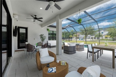 Experience the epitome of luxury living in this stunning smart on Silver Dollar Golf and Trap Club in Florida - for sale on GolfHomes.com, golf home, golf lot