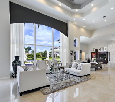 Beautifully renovated custom two story 5 bedroom estate situated on St. Andrews Country Club of Boca Raton in Florida - for sale on GolfHomes.com, golf home, golf lot