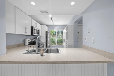 Live the Island Life! 2 Bedroom, 2 Bath condo with many updates on Isla Del Sol Yacht and Country Club in Florida - for sale on GolfHomes.com, golf home, golf lot