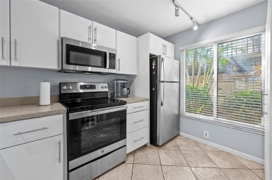 Live the Island Life! 2 Bedroom, 2 Bath condo with many updates on Isla Del Sol Yacht and Country Club in Florida - for sale on GolfHomes.com, golf home, golf lot