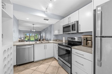 Live the Island Life! 2 Bedroom, 2 Bath condo with many updates on Isla Del Sol Yacht and Country Club in Florida - for sale on GolfHomes.com, golf home, golf lot