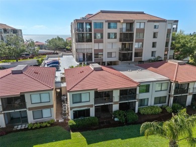 Live the Island Life! 2 Bedroom, 2 Bath condo with many updates on Isla Del Sol Yacht and Country Club in Florida - for sale on GolfHomes.com, golf home, golf lot
