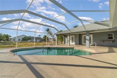 Priced well below comparable homes, This charming single-level on Palmetto-Pine Country Club in Florida - for sale on GolfHomes.com, golf home, golf lot