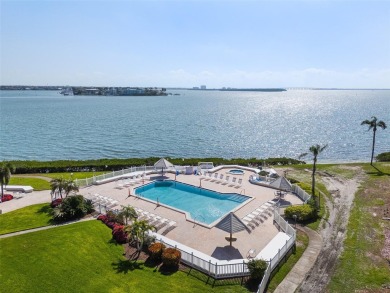 Live the Island Life! 2 Bedroom, 2 Bath condo with many updates on Isla Del Sol Yacht and Country Club in Florida - for sale on GolfHomes.com, golf home, golf lot