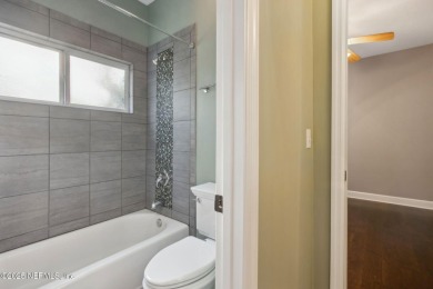 This charming 3-bedroom, 2-bathroom home has been beautifully on Magnolia Point Golf and Country Club in Florida - for sale on GolfHomes.com, golf home, golf lot