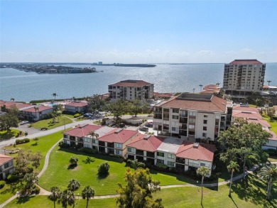 Live the Island Life! 2 Bedroom, 2 Bath condo with many updates on Isla Del Sol Yacht and Country Club in Florida - for sale on GolfHomes.com, golf home, golf lot