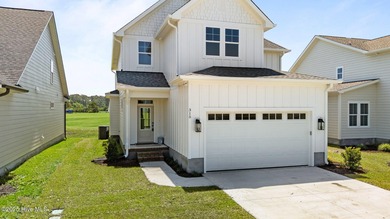 Discover this exceptional home in The Beaufort Club, a premier on North River Club in North Carolina - for sale on GolfHomes.com, golf home, golf lot