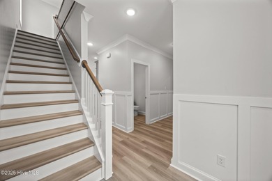 Discover this exceptional home in The Beaufort Club, a premier on North River Club in North Carolina - for sale on GolfHomes.com, golf home, golf lot