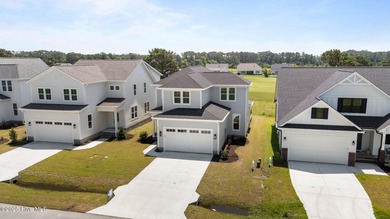Discover this exceptional home in The Beaufort Club, a premier on North River Club in North Carolina - for sale on GolfHomes.com, golf home, golf lot