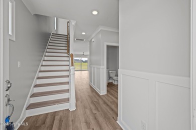 Discover this exceptional home in The Beaufort Club, a premier on North River Club in North Carolina - for sale on GolfHomes.com, golf home, golf lot