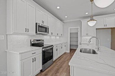 Discover this exceptional home in The Beaufort Club, a premier on North River Club in North Carolina - for sale on GolfHomes.com, golf home, golf lot