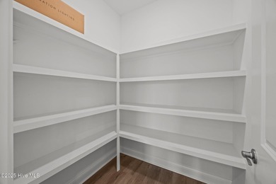 Discover this exceptional home in The Beaufort Club, a premier on North River Club in North Carolina - for sale on GolfHomes.com, golf home, golf lot