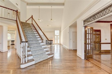 Nestled within the prestigious, guard-gated enclave of St Ives on St. Ives Golf and Country Club in Georgia - for sale on GolfHomes.com, golf home, golf lot