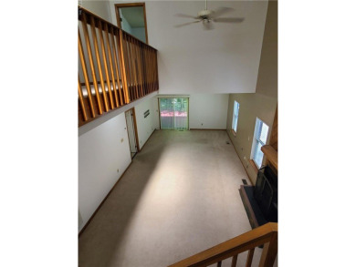 Three bedrooms upstairs, including two and a half bathrooms. The on Red Wing Lake Golf Course in Virginia - for sale on GolfHomes.com, golf home, golf lot