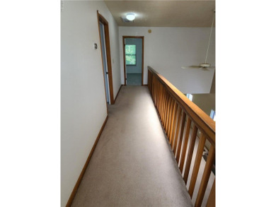 Three bedrooms upstairs, including two and a half bathrooms. The on Red Wing Lake Golf Course in Virginia - for sale on GolfHomes.com, golf home, golf lot