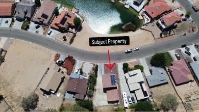 STUNNING LAKE VIEWS + PAID SOLAR!
Enjoy unobstructed water views on Silver Lakes Golf Course in California - for sale on GolfHomes.com, golf home, golf lot