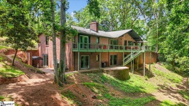 Welcome to 106 E Lewis Road -- a stunning Mid-Century Modern on The Walker Golf Course At Clemson University in South Carolina - for sale on GolfHomes.com, golf home, golf lot