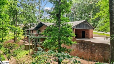 Welcome to 106 E Lewis Road -- a stunning Mid-Century Modern on The Walker Golf Course At Clemson University in South Carolina - for sale on GolfHomes.com, golf home, golf lot