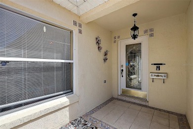 WONDERFUL, TURNKEY, BLOCK and STUCCO 2/2 Woodlawn Courtyard on The Links of Spruce Creek in Florida - for sale on GolfHomes.com, golf home, golf lot