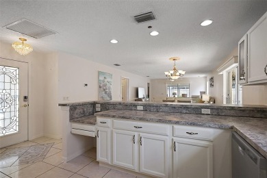 WONDERFUL, TURNKEY, BLOCK and STUCCO 2/2 Woodlawn Courtyard on The Links of Spruce Creek in Florida - for sale on GolfHomes.com, golf home, golf lot