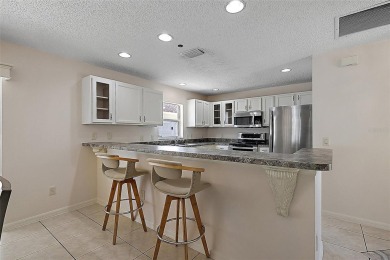 WONDERFUL, TURNKEY, BLOCK and STUCCO 2/2 Woodlawn Courtyard on The Links of Spruce Creek in Florida - for sale on GolfHomes.com, golf home, golf lot