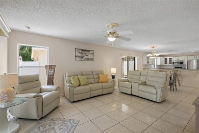 WONDERFUL, TURNKEY, BLOCK and STUCCO 2/2 Woodlawn Courtyard on The Links of Spruce Creek in Florida - for sale on GolfHomes.com, golf home, golf lot