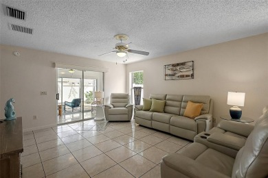 WONDERFUL, TURNKEY, BLOCK and STUCCO 2/2 Woodlawn Courtyard on The Links of Spruce Creek in Florida - for sale on GolfHomes.com, golf home, golf lot