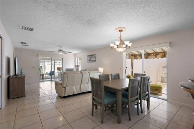 WONDERFUL, TURNKEY, BLOCK and STUCCO 2/2 Woodlawn Courtyard on The Links of Spruce Creek in Florida - for sale on GolfHomes.com, golf home, golf lot