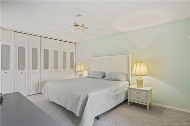 Enjoy first floor living with fantastic views from every room on Martin County Golf Course in Florida - for sale on GolfHomes.com, golf home, golf lot