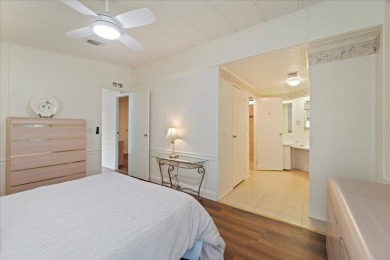 Welcome to this beautiful home that is located inside the 55 on Lake Fairways Country Club in Florida - for sale on GolfHomes.com, golf home, golf lot