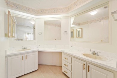 Welcome to this beautiful home that is located inside the 55 on Lake Fairways Country Club in Florida - for sale on GolfHomes.com, golf home, golf lot
