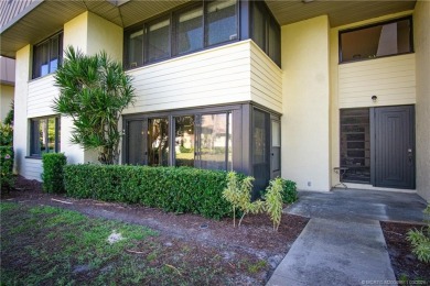 Enjoy first floor living with fantastic views from every room on Martin County Golf Course in Florida - for sale on GolfHomes.com, golf home, golf lot