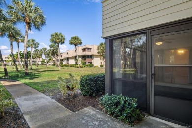 Enjoy first floor living with fantastic views from every room on Martin County Golf Course in Florida - for sale on GolfHomes.com, golf home, golf lot