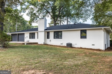 Completely remodeled brick ranch just steps from Cherokee Golf on Cherokee Golf and Country Club in Georgia - for sale on GolfHomes.com, golf home, golf lot