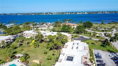 Enjoy first floor living with fantastic views from every room on Martin County Golf Course in Florida - for sale on GolfHomes.com, golf home, golf lot